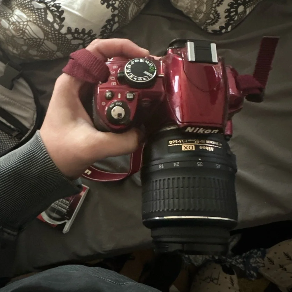 Nikon D3100 with bag, battery, etc